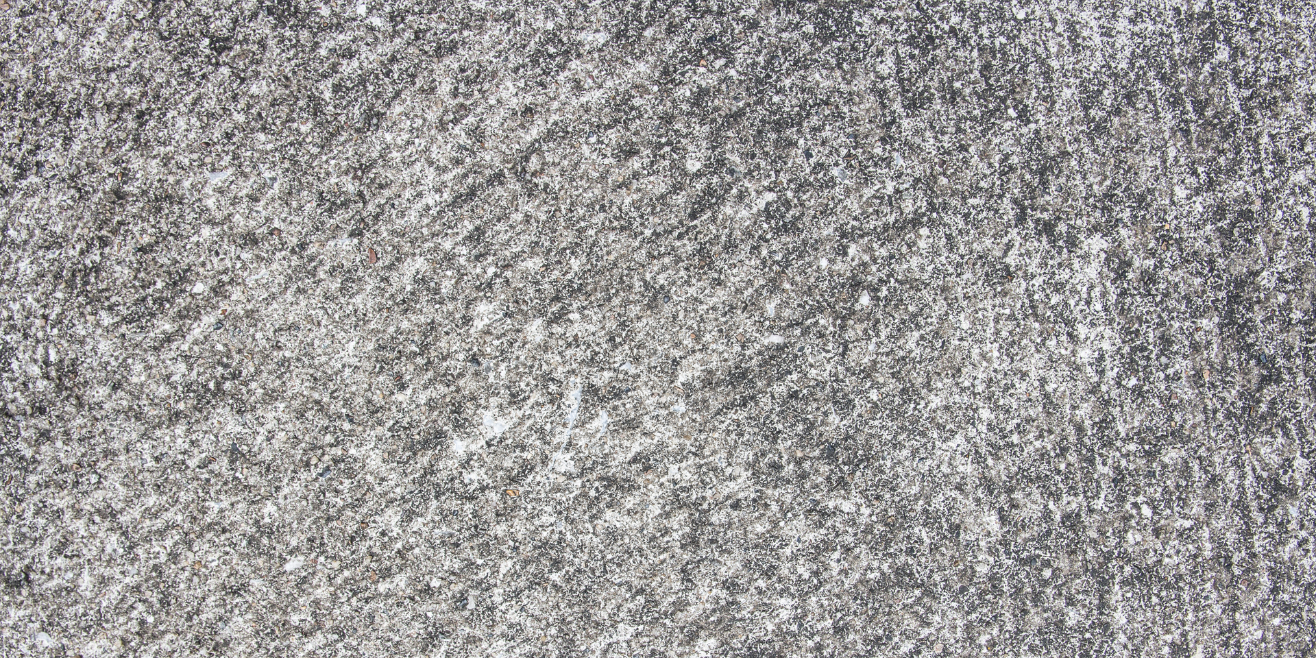 A close up of a gray carpet texture.