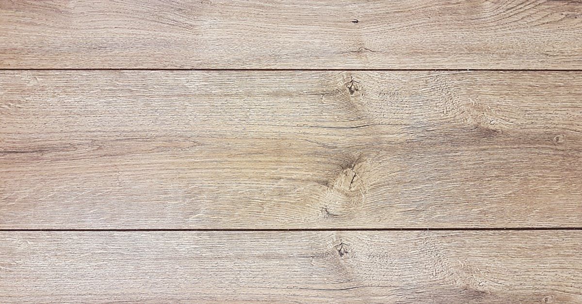 A close up of a wooden surface with a grainy texture.