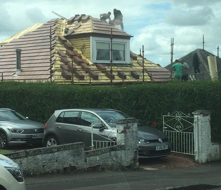 Work underway on a new slate roof by DC Roofcare Irvine