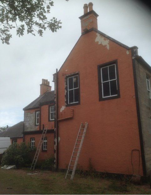 Exterior wall painting by DC Roofcare