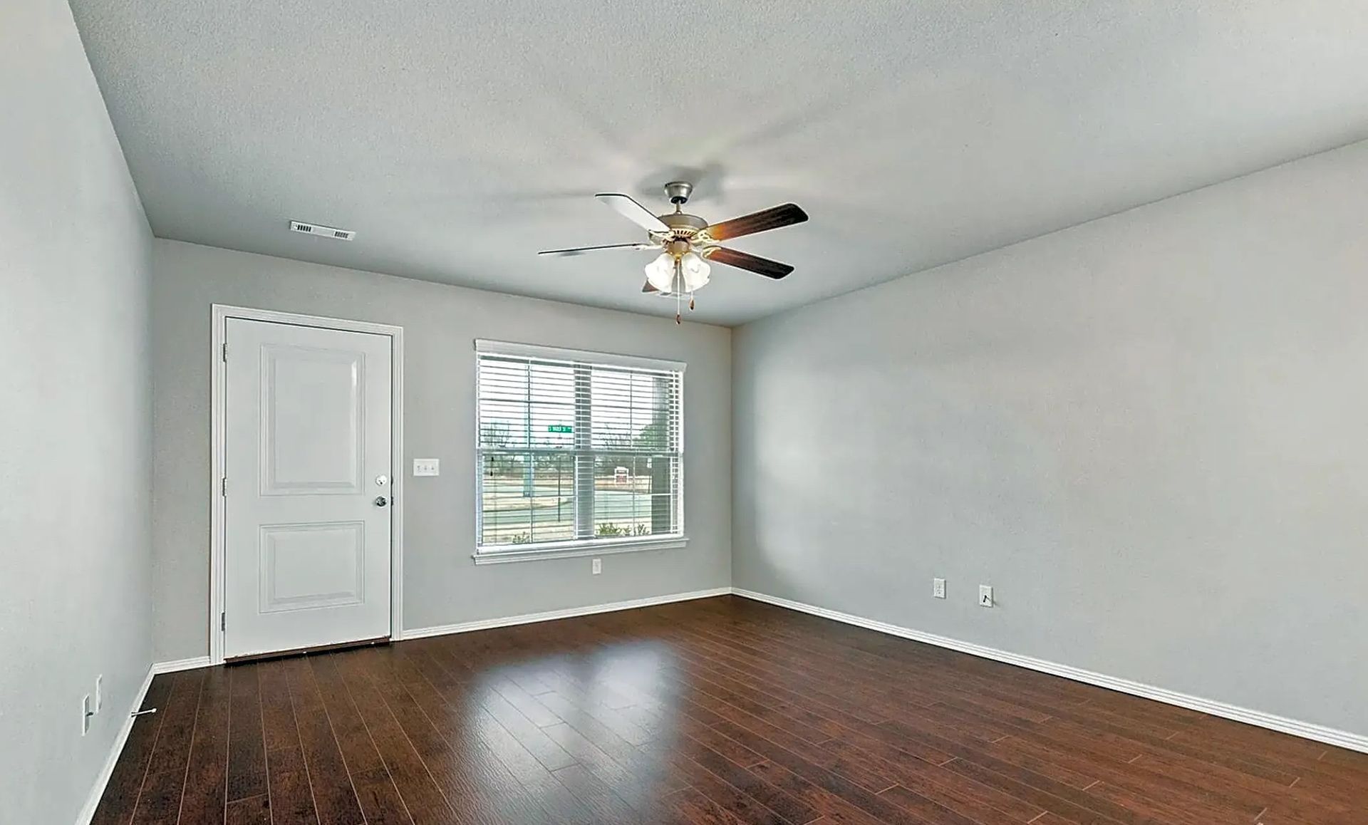 living room alternate angle showing natural light
