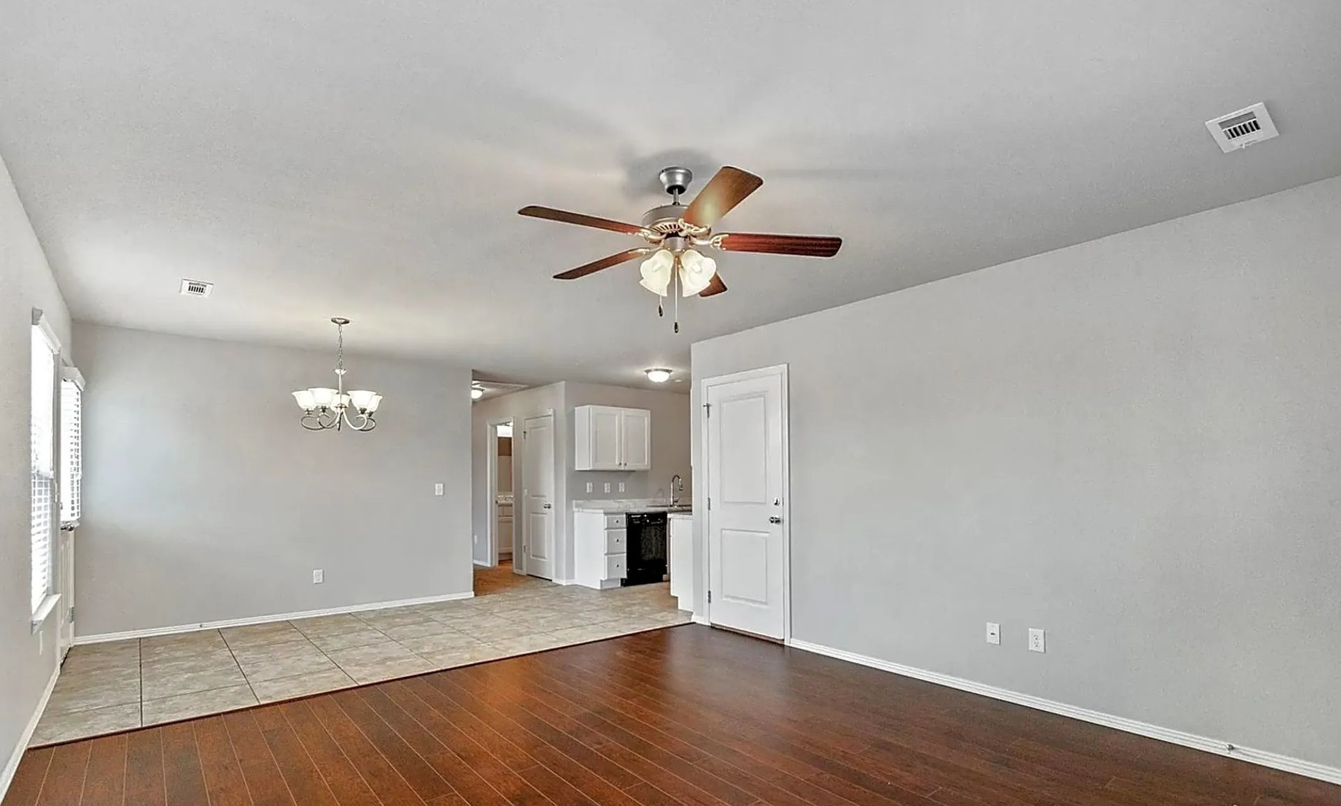 living room with kitchen in the background