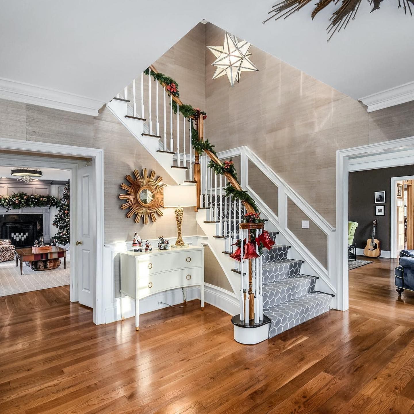 A staircase in a house decorated for christmas