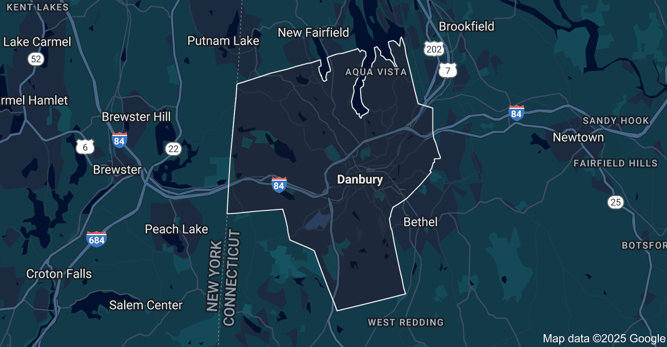 A living room filled with furniture and a chandelier.