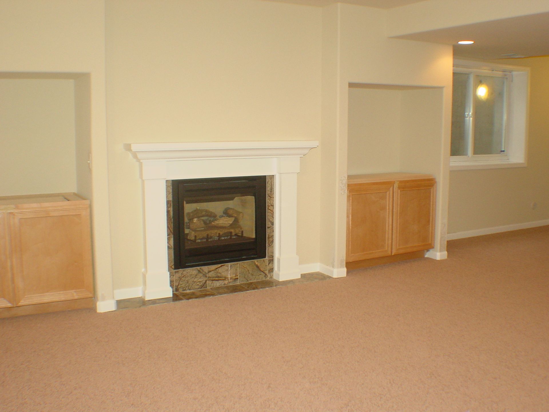 There is a fireplace in the middle of the room.