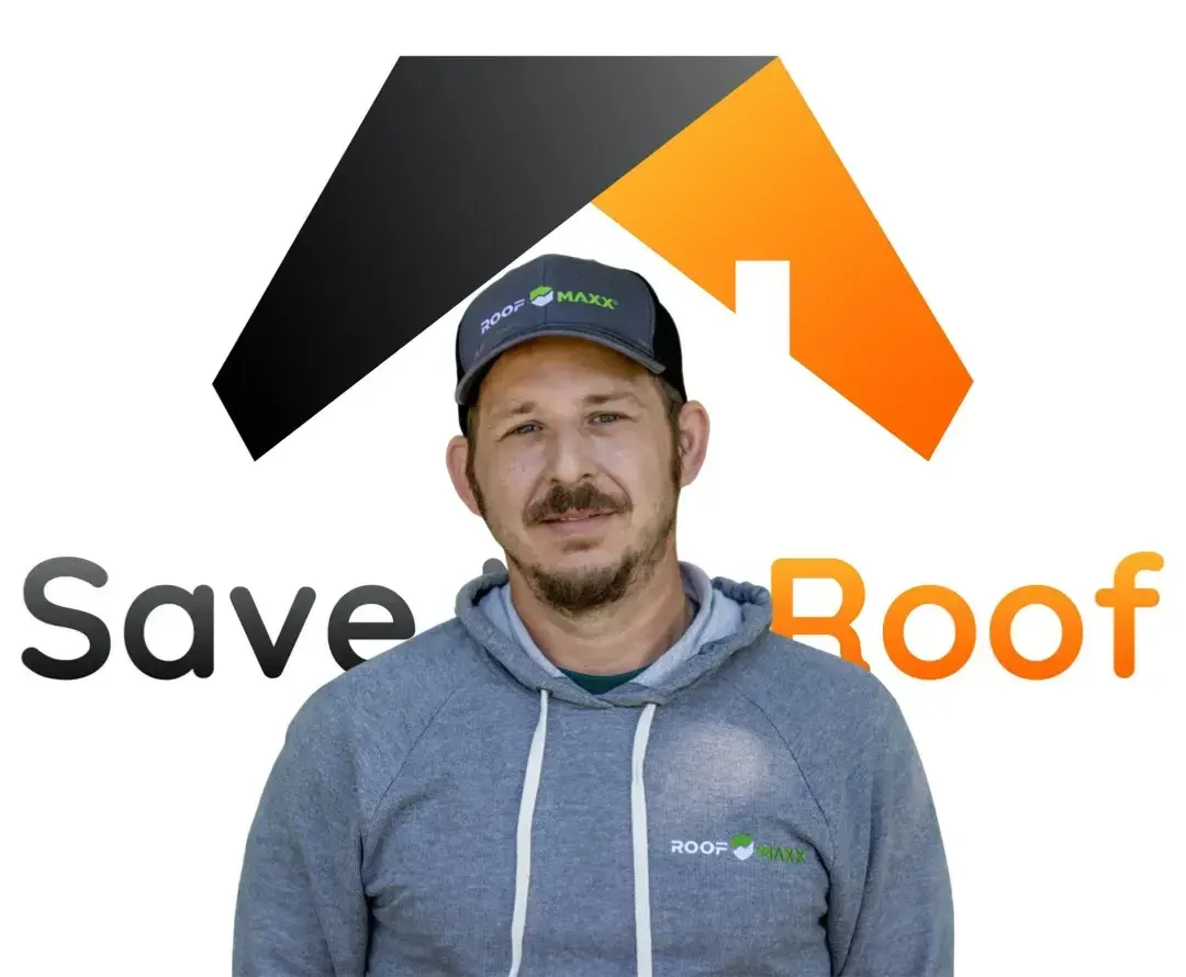 A man is standing in front of a save roof logo