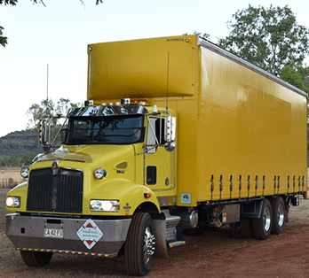 Yellow truck — Freight Services in Humpty Doo, NT