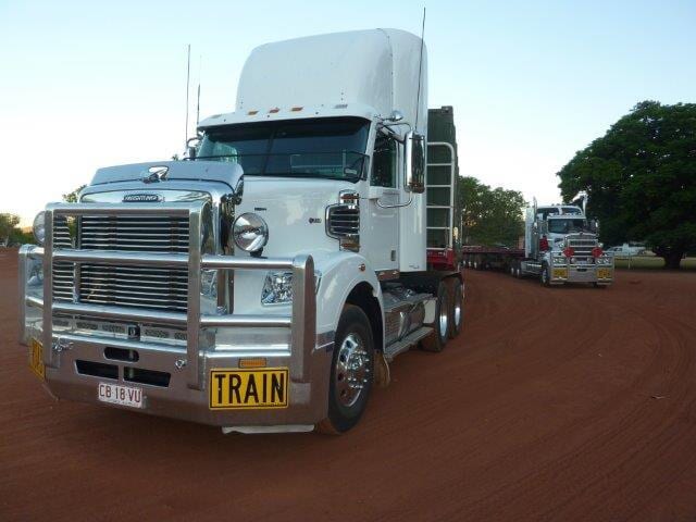 2 white trucks — Freight Services in Humpty Doo, NT