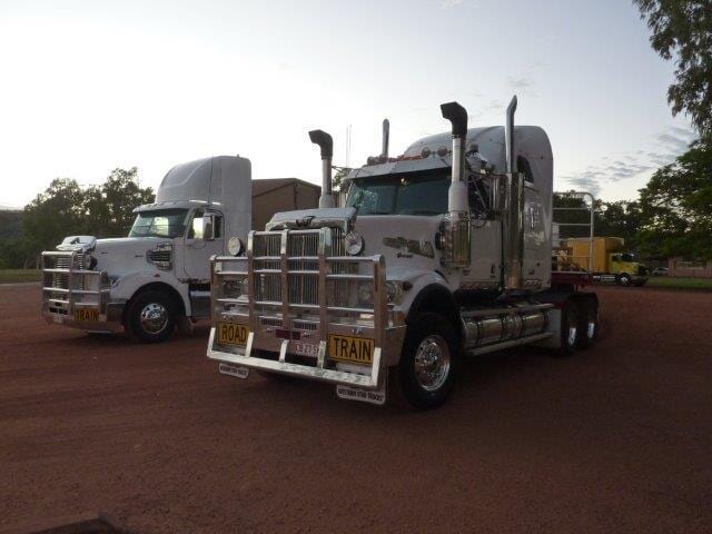 2 white trucks side view — Freight Services in Humpty Doo, NT