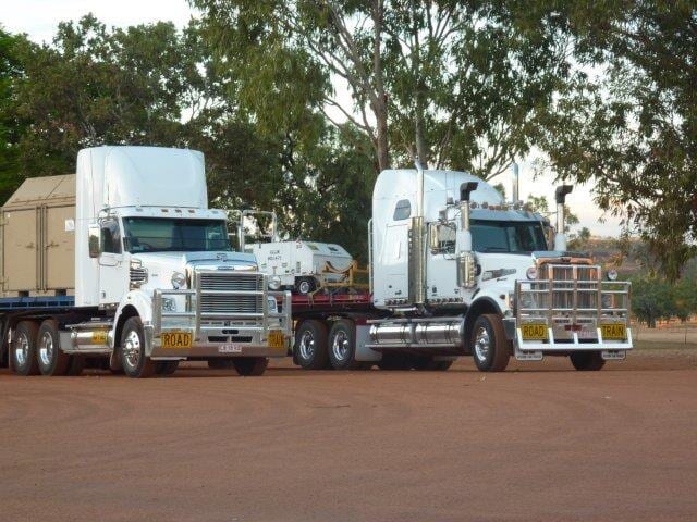 Two white trucks — Freight Services in Humpty Doo, NT