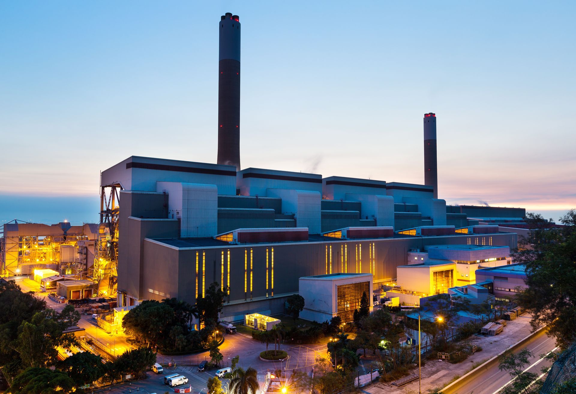 An aerial view of a power plant at night