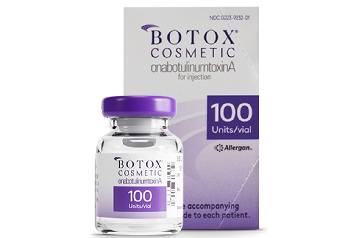 A bottle of botox cosmetic next to a box.