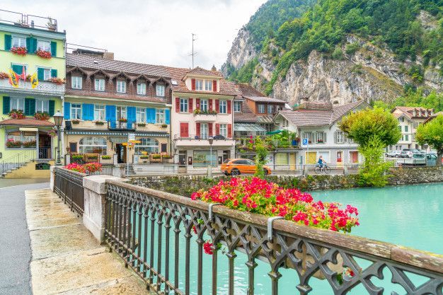 There is a bridge over a river in the middle of a city.