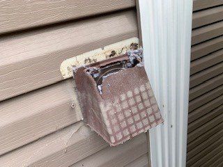 dryer vent on exterior of house