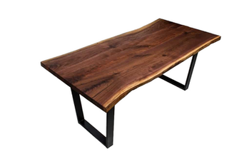 A wooden table with metal legs on a white background