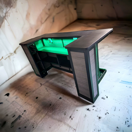 A wooden table with a green light on it