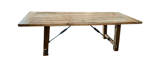 A wooden table with metal legs on a white background