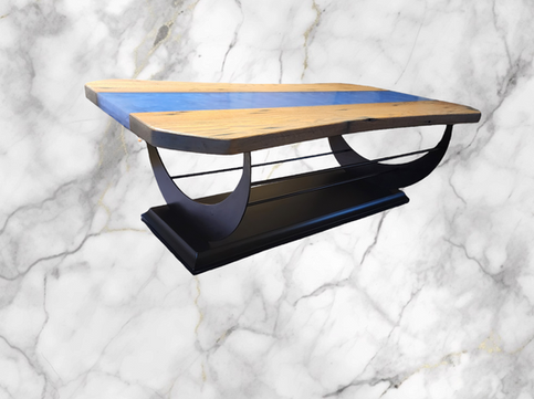 A wooden coffee table with a blue stripe on it is sitting on a marble surface.