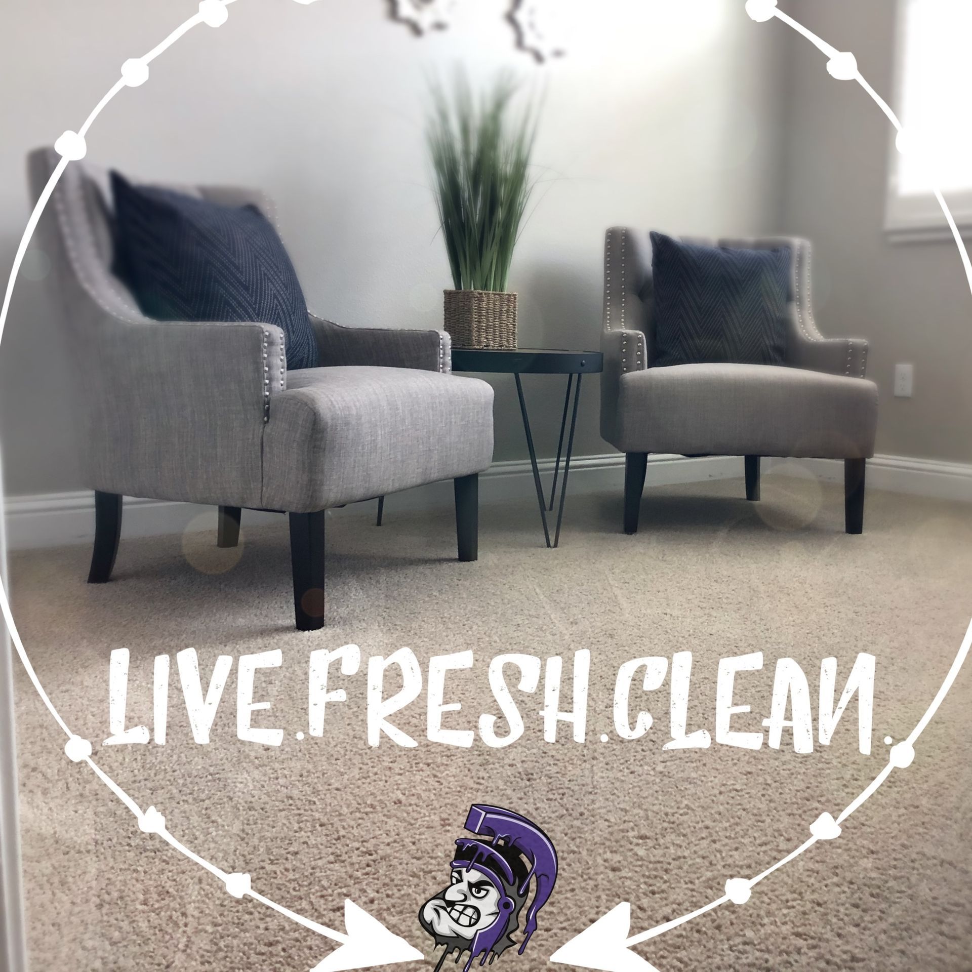 A living room with two chairs and the words live fresh clean