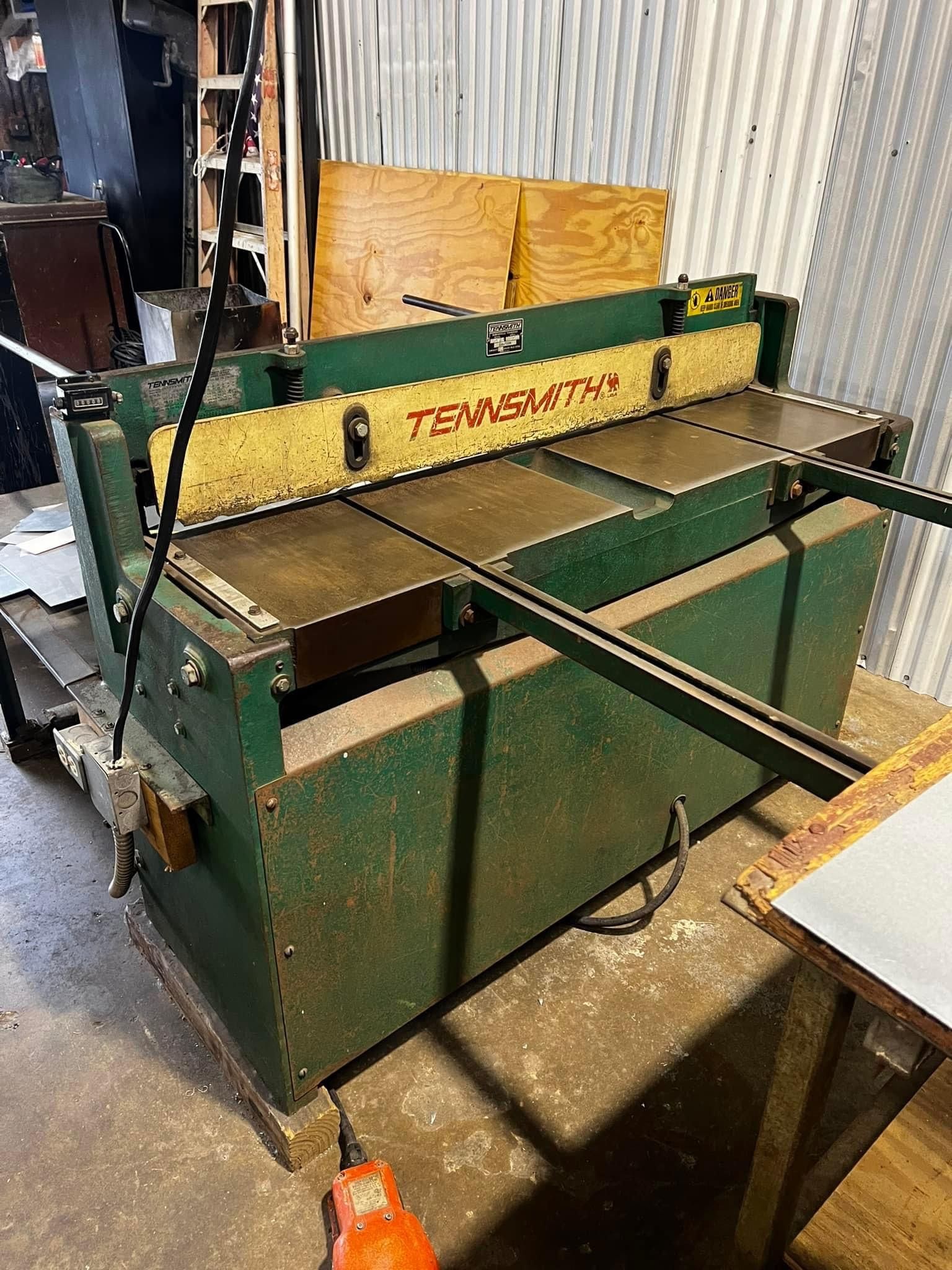 A machine is sitting on top of a table in a room.