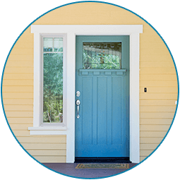 Home With Blue Door - Window & Door Installation in Cheyenne, WY