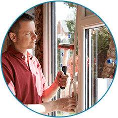 Worker Installing New Windows In House - Window & Door Installation in Cheyenne, WY