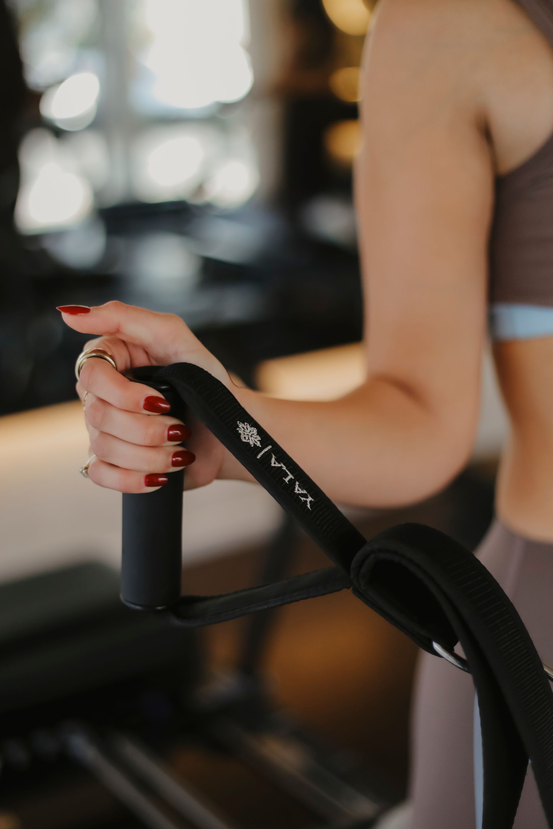 Reformer carriage and straps for Pilates training at YALA Evolved Pilates Cypress
