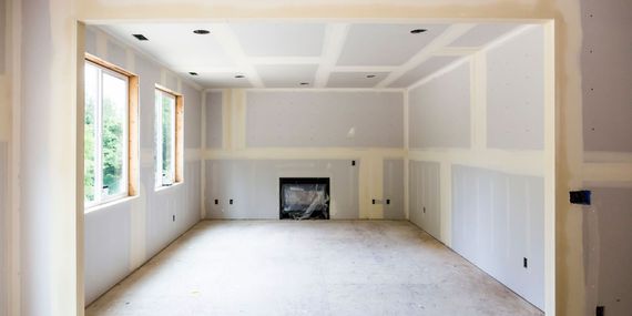There is a fireplace in the middle of the room.