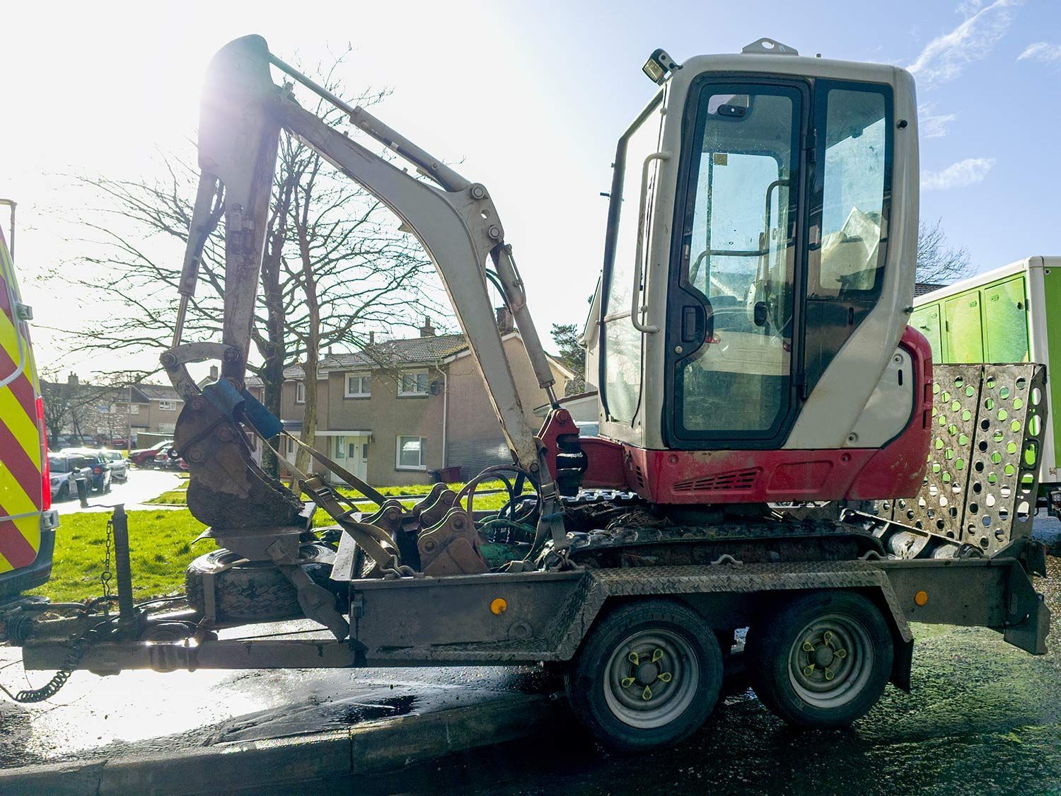 Mini excavator on a trailer
