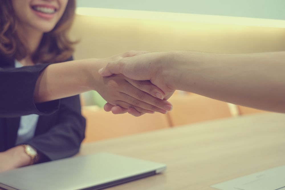 People Shaking Hands — Northern Accounting Solutions In Brisbane, QLD
