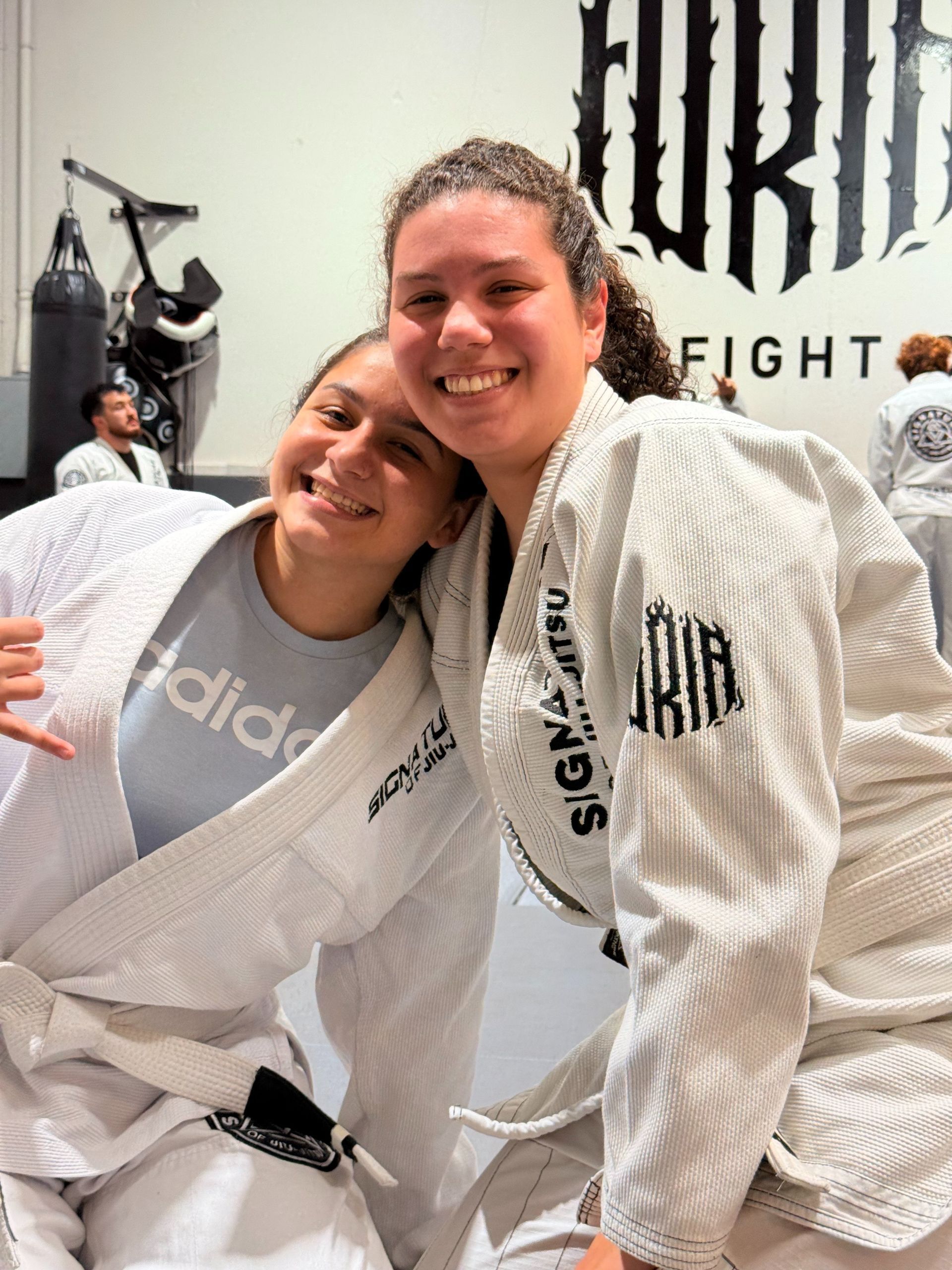 Kids practice safe grappling drills at Signature of Jiu-Jitsu in Belmont, CA, building confidence.