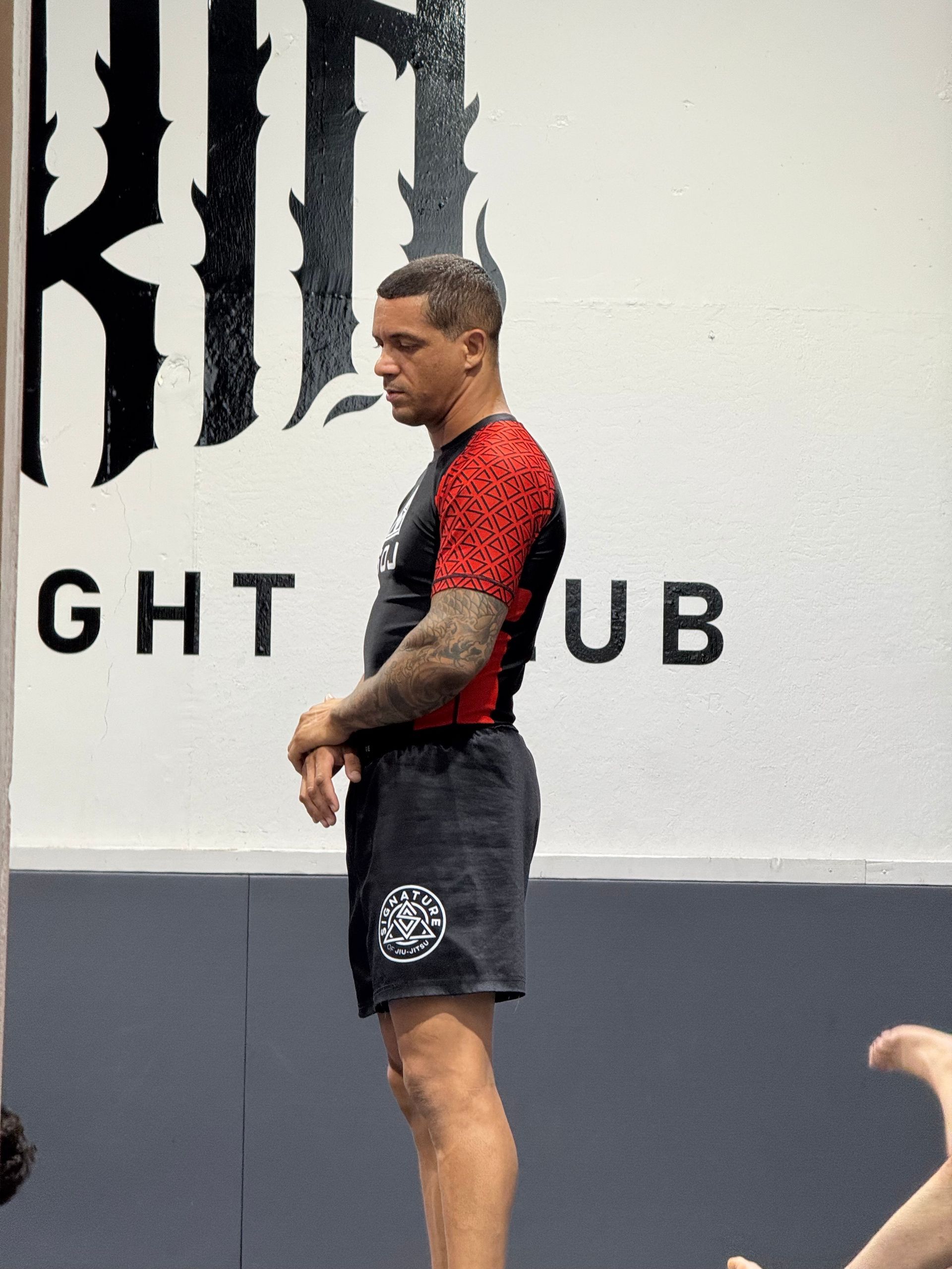 Adults practicing Brazilian Jiu-Jitsu at Signature of Jiu-Jitsu in Belmont, CA, building fitness.