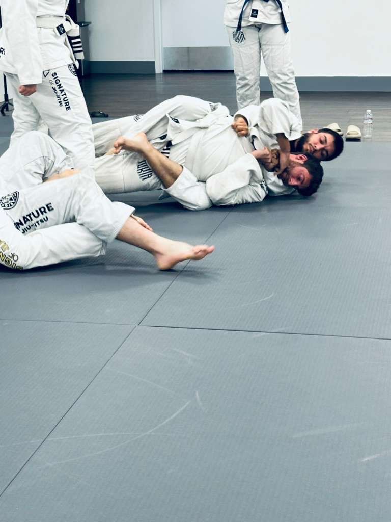 Beginners training Jiu-Jitsu at Signature of Jiu-Jitsu in Belmont, CA building strength, and skills.