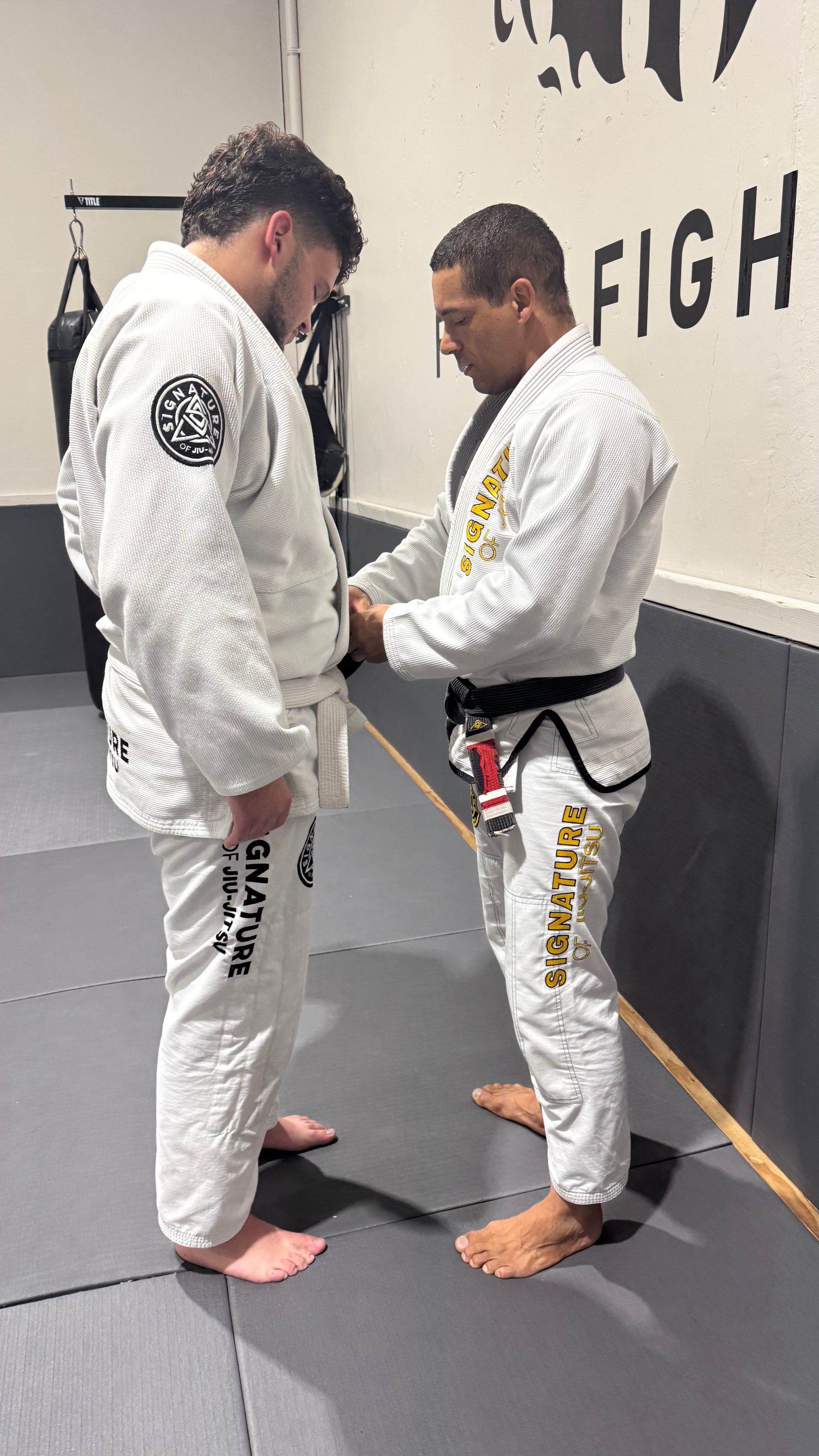 Students practicing Brazilian Jiu-Jitsu drills at Signature of Jiu-Jitsu in Belmont, CA, building confidence together
