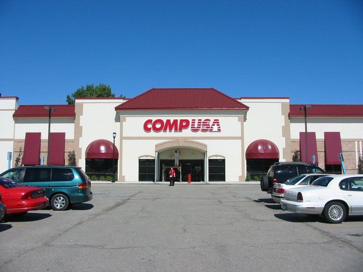 Compusa Building With Red Awnings — Roseville, MI — J.C. Goss Company