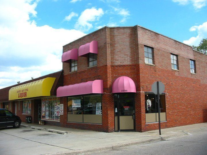 Pink and Yellow Awning — Roseville, MI — J.C. Goss Company