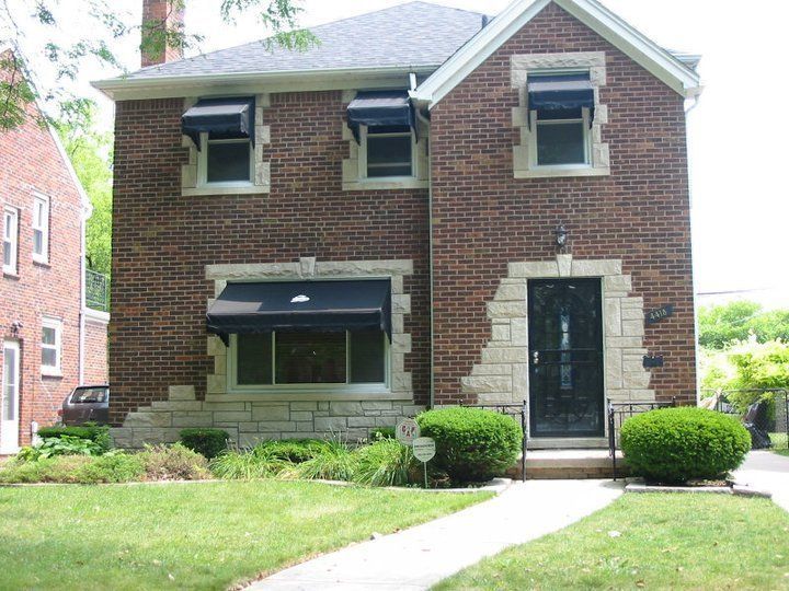 Multiple Black Residential Window and Door Awnings — Roseville, MI — J.C. Goss Company