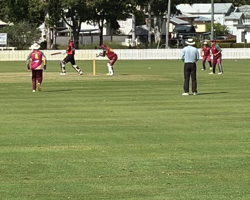 A Group Of People Are Playing A Game Of Cricket On A Field — Maryborough Cricket Club In Maryborough, QLD