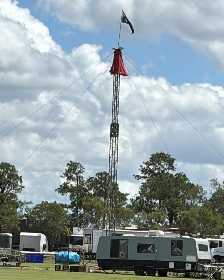 A Tower With A Red Flag On Top Of It — Maryborough Cricket Club In Maryborough, QLD