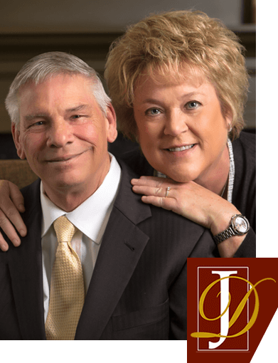 Photo of James and Terri Weldy Johnson-Danielson Funeral Home with Johnson-Danielson logo emblem in right hand corner