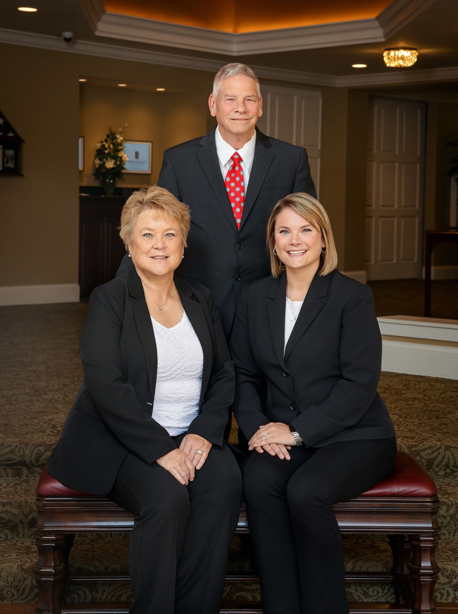 Photo of James and Terri Weldy Johnson-Danielson Funeral Home with Johnson-Danielson logo emblem in right hand corner