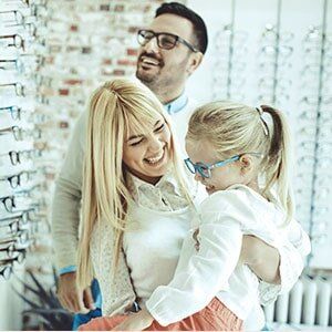 Eye Glasses Center — Family Choosing For A Frame in Georgia, VT