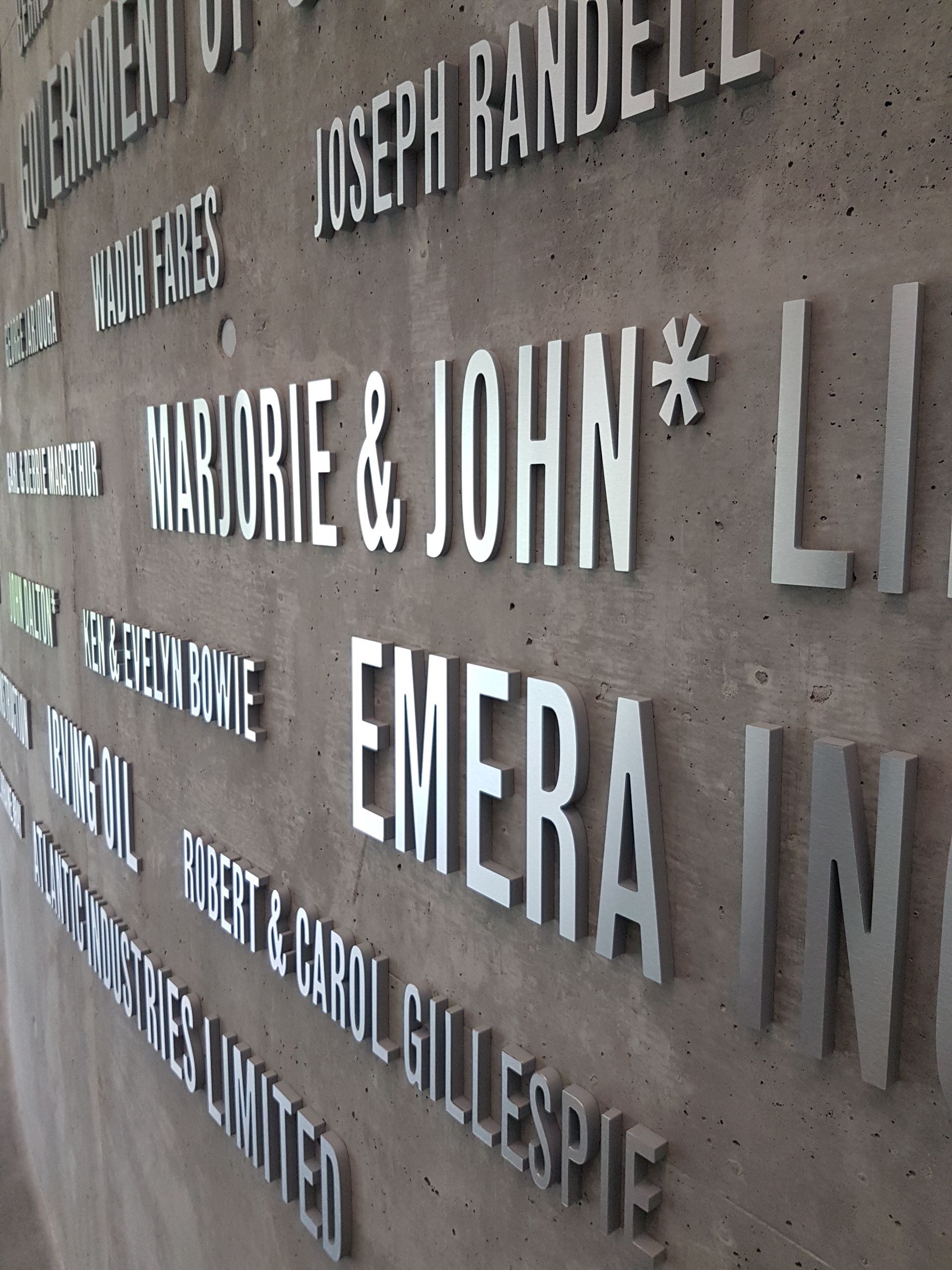 a hallway with a sign that says thank you to our donors