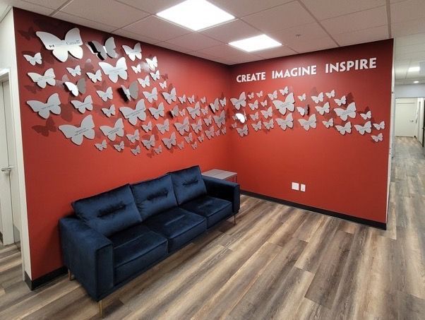 a large wall with a lot of pictures on it .