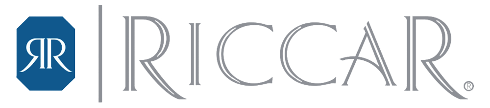 Logo for Riccar: a blue, octagonal emblem with