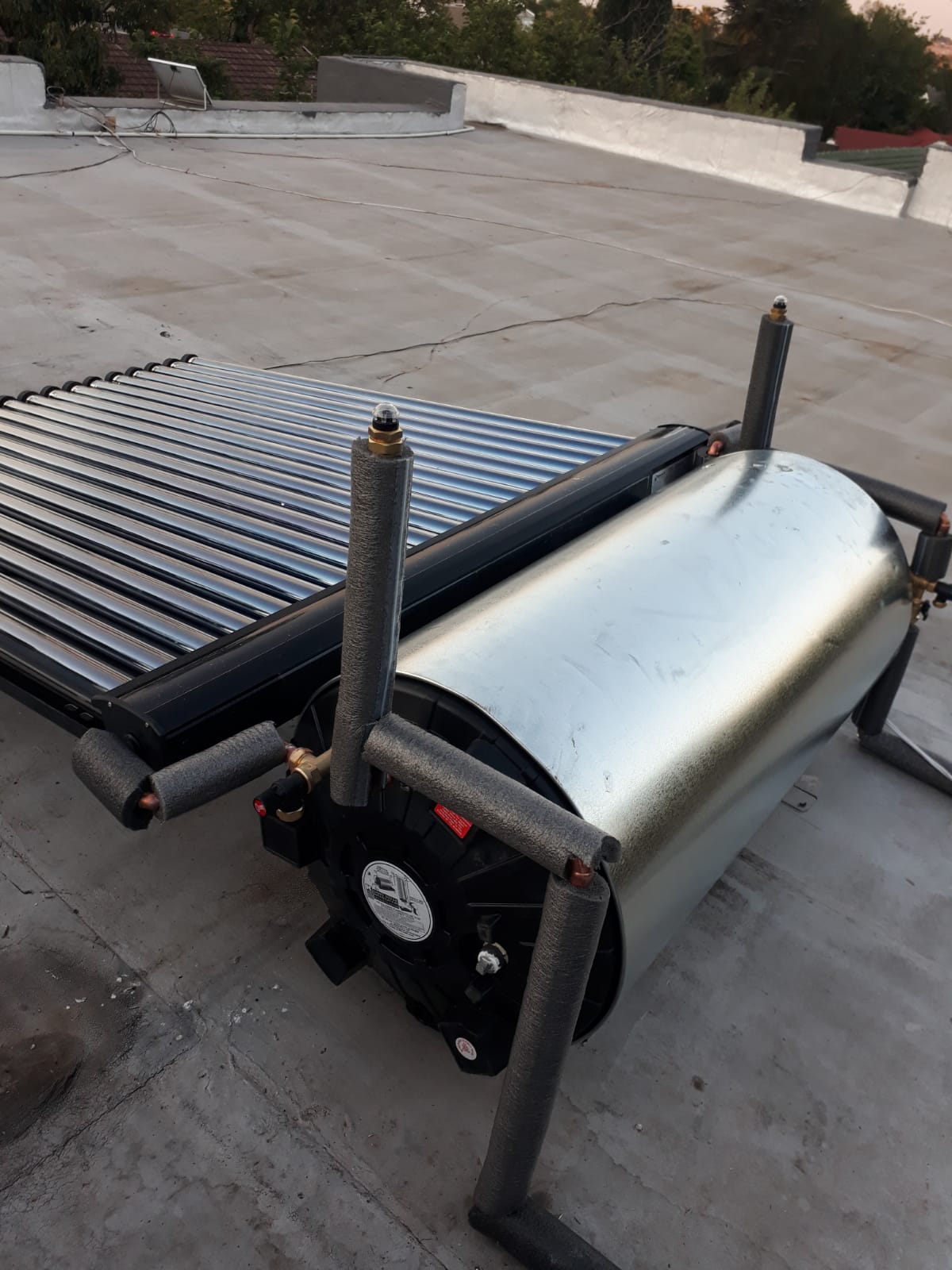 solar geyser on a flat rooftop