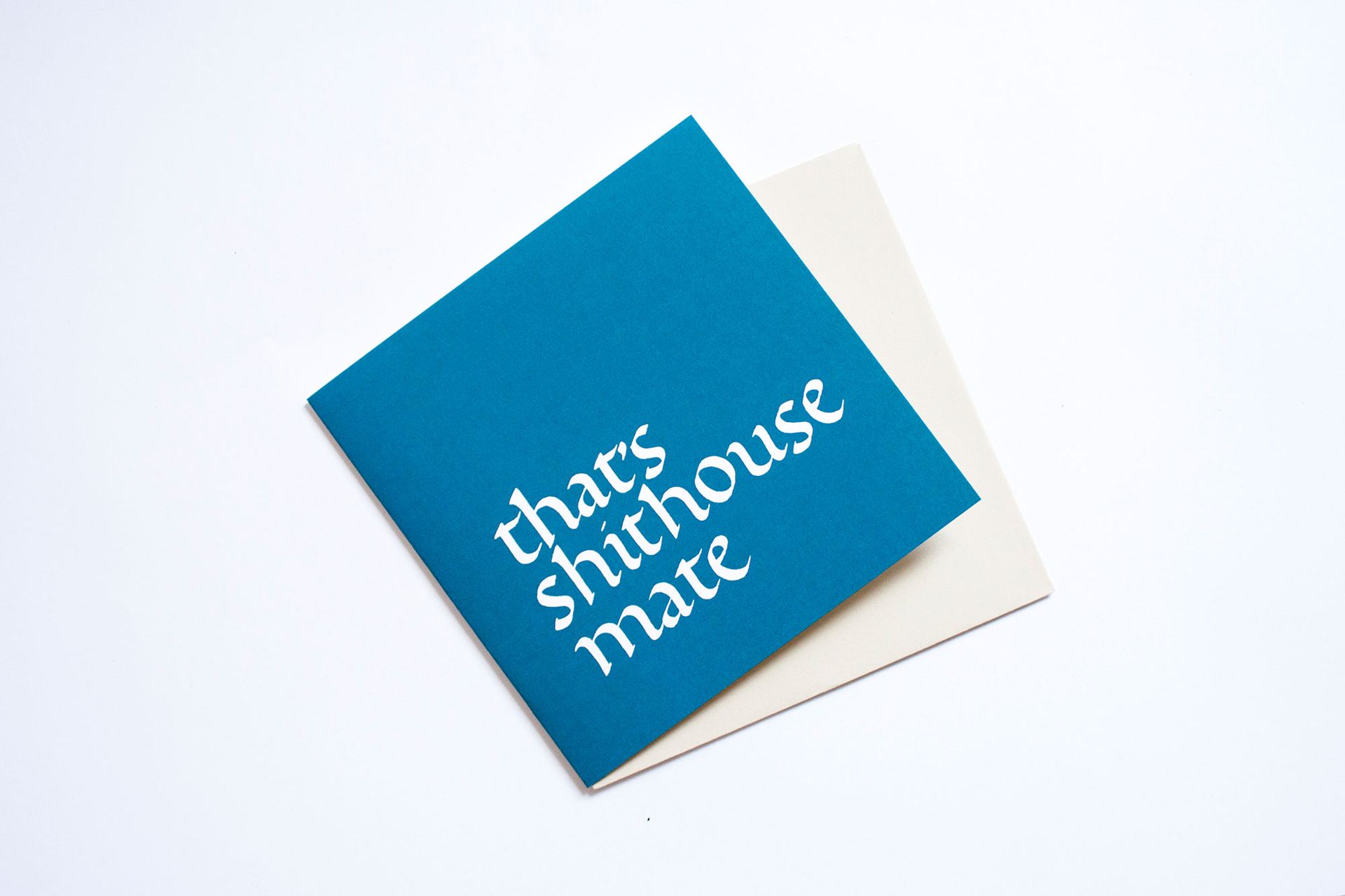 A square blue card with white text that reads