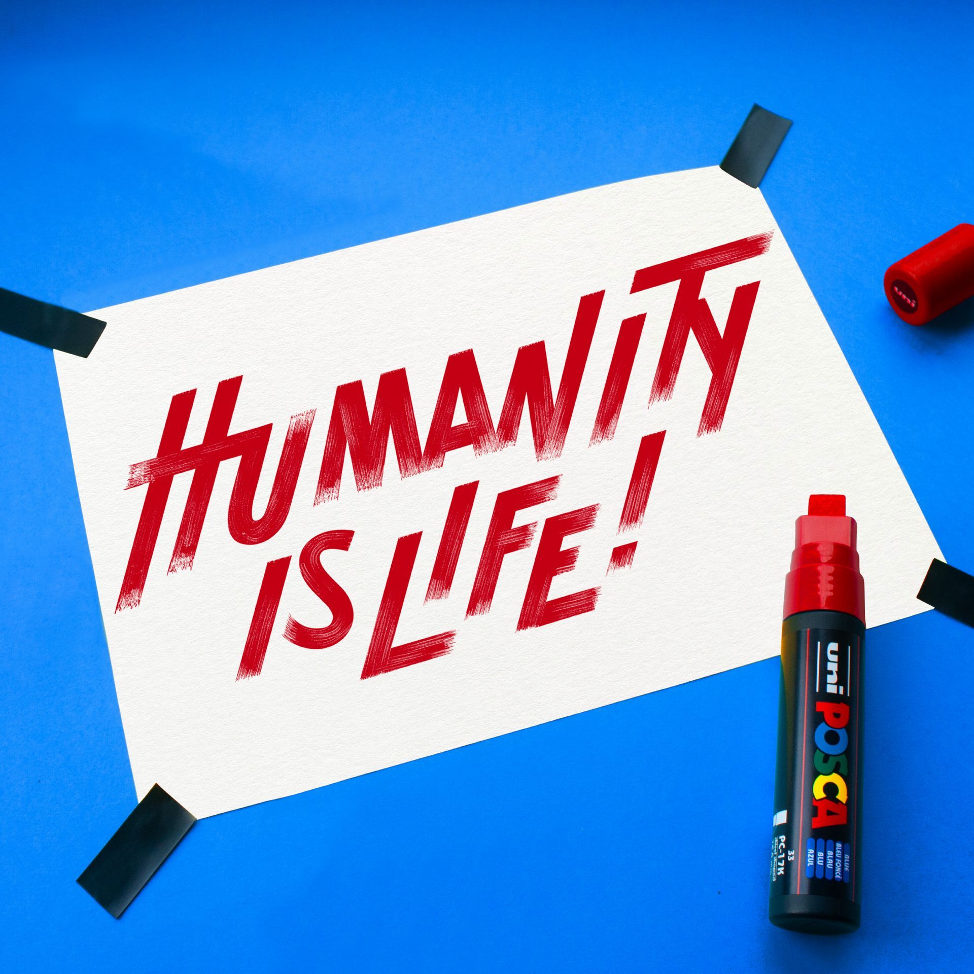 Red hand-lettered text 