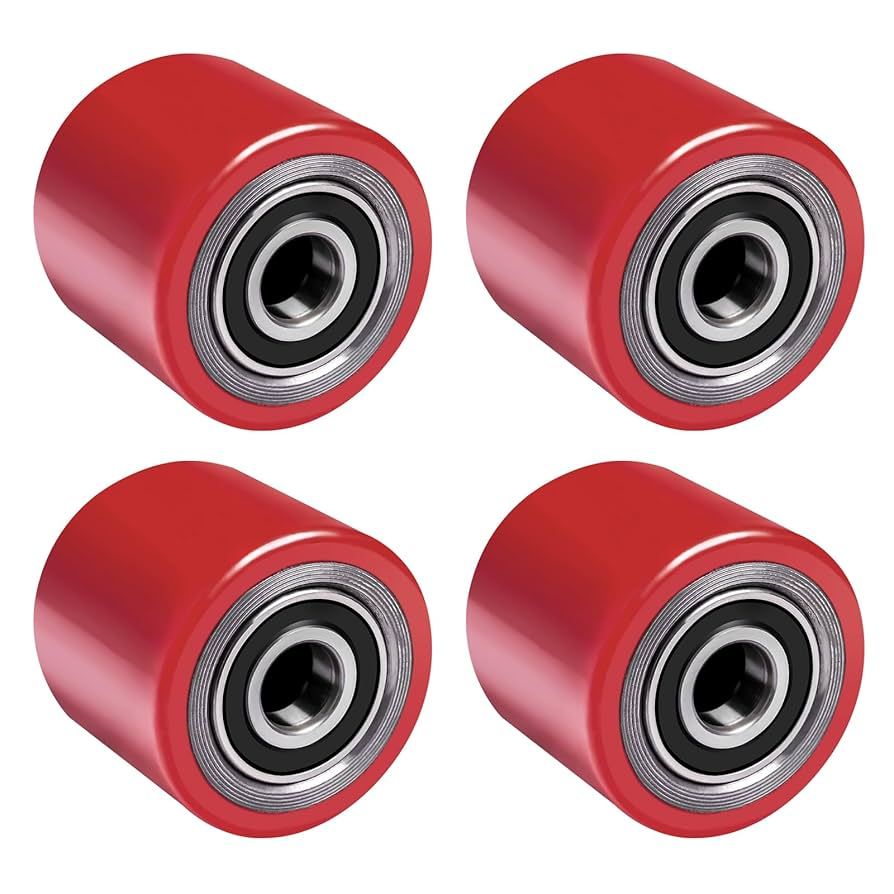 Ruedas industriales giratorias de diversos tamaños y colores, principalmente rojas y blancas, expuestas juntas.