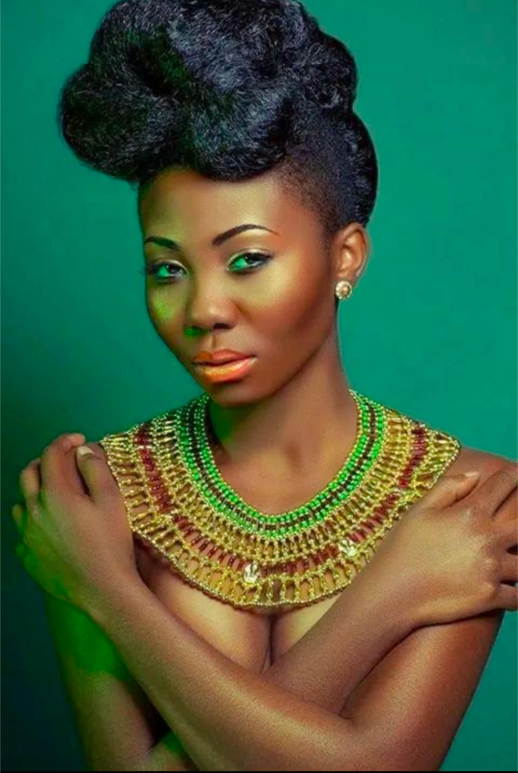 Portrait of A Woman Against a Solid Green Background